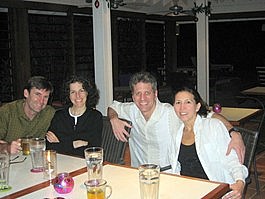 After a scrumptious lobster feast, Bill, Lori, Steven, and Denise enjoy a beer at what would become their table