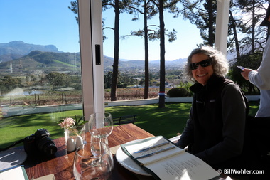Lori enjoys the view from La Petite Ferme, and will soon enjoy the wine and food too