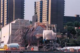 A sub in dry dock (prop covered for the spys)