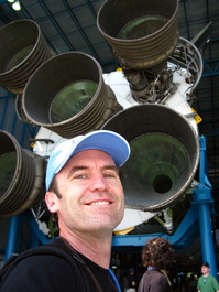 Bill takes a self-portrait in front of the
                       Saturn 5 engines that were so big, it was
                       impossible not to get them in the background
