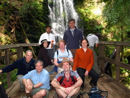 James (Deb's cousin), Dave, Lori, Kunal, Deb, Bill, Jeff (Deb's other cousin), Candace (Jeff's wife), and a random photographer enjoy lunch on the platform across from Berry Creek Falls