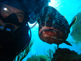 Self-portrait with grouper--and Deb, the queen of the photobombers