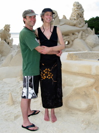 Bill and Lori in front of the sand sculpture