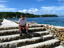 Lori on the pier that reaches out to the Ngerdiluches Reef, the only spot in Palau where you can surf from the shore