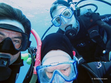 A group shot of Bill, Deb, and Lori on the last dive; only Deb is aware of the giant bull shark coming in from the depths for the kill