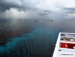 Lots of dive boats at the Blue Hole, and some weather that made it nearly impossible for us to get there