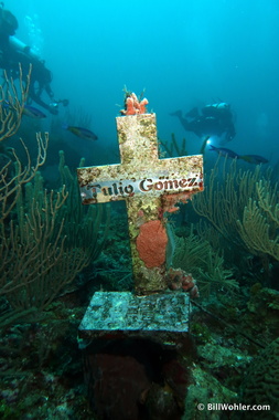 A memorial for Tulio Gomez, a divemaster and friend of Jesse's, who died from a heart attack here