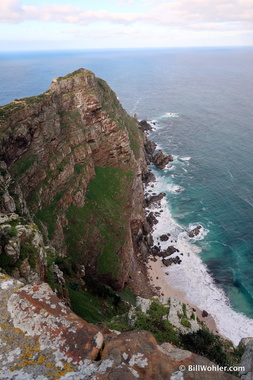 The New Cape Point Lighthouse is the white speck half-way down the nose of the hill