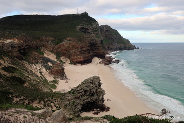 Dias Beach with the old lighthouse (top middle) and new lighthouse (lower right edge of cliff)