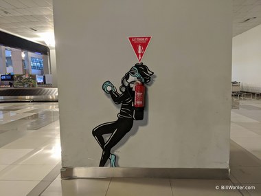The Jakarta airport features murals of divers that incorporate fire extinguishers as their tanks