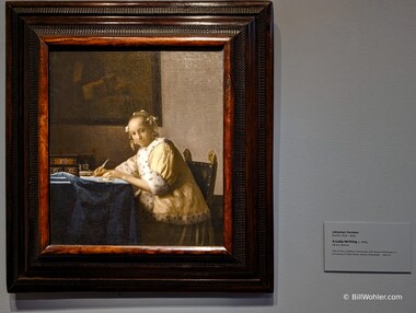 A Lady Writing a Letter by Johannes Vermeer, 1665