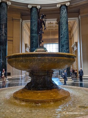 Lori admires Mercury, by an anonymous artist, 1780-1850, based upon one of four statues by Giambologna