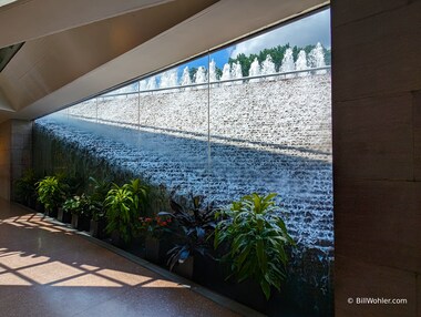 The cascade waterfall between the east and west buildings