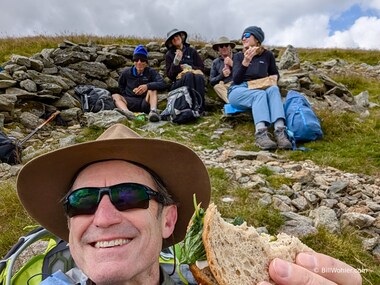 A brief lunch break behind a wind break