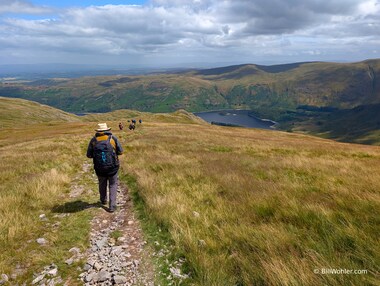 Tony heads off with the Haweswater Reservoir in the background