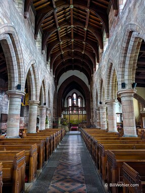 The pews and altar of the Kirkby Stephen Parish Church