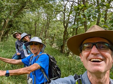 Robert, Lori, Dan, and I goof while walking under the alder trees