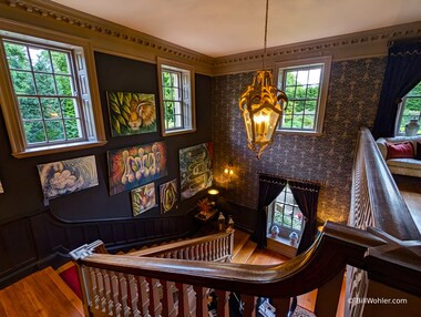 A striking stairwell in Easby Hall, even without the art