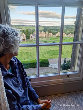 Lori gazes out the Easby Abbey from our room in Easby Hall