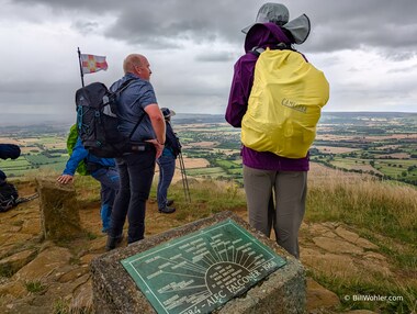 Tony and Lori gaze across the dale whose placenames are engraved on the plate