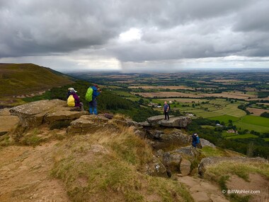 Dan, Lori, and Stanko take photos of Tony on the Wainstones