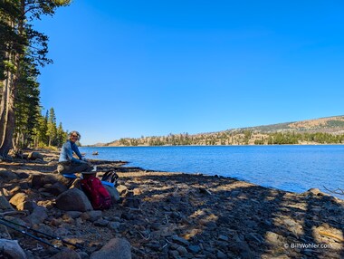 Lori enjoys lunch at Caples Lake during our acclimationn hike