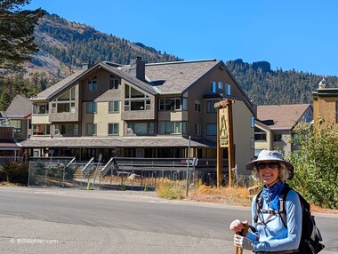 Lori in front of the condo