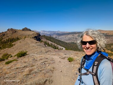 Lori on the descent from Glove Rock in front of Martin Point