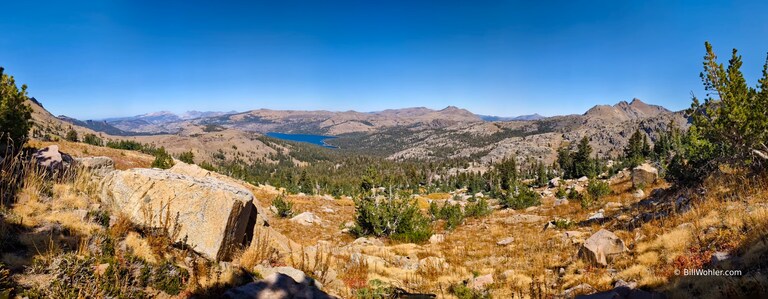 A panorama from our luncheon spot includes Desolation Wilderness on the left, Caples Lake, a few unknown peaks, and The Sisters on the right