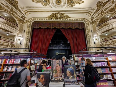 Lori on the floor of the El Ateneo Grand Splendid (https://en.wikipedia.org/wiki/El_Ateneo_Grand_Splendid), the "world's most beautiful bookstore," which was originally a theater