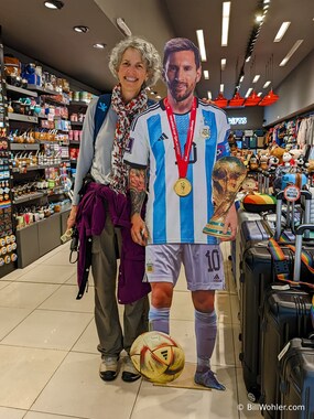 Lori couldn't help but pose with Messi