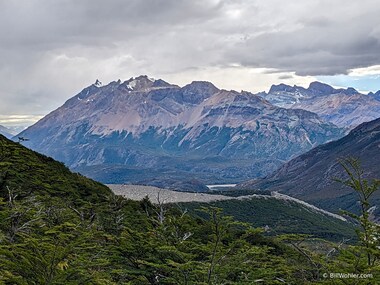 Glacial cut mountains in the background, the rubble of glacial moraine in the foreground
