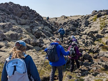 The gang starts up an even more irregular trail on the second hike through the lava fields