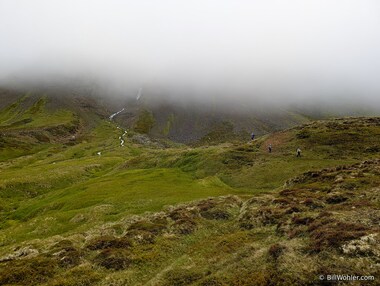 Jason, Jennifer, and L&iacute;sa descend near the waterfalls