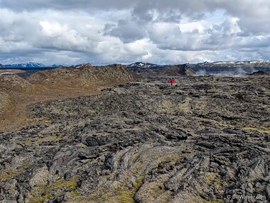 Dan walks through a lava field that was formed when one of the volcanoes in the Krafla volcanic region erupted in the 70s
