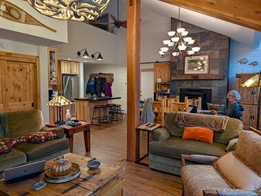 Lori catches up on email in Vera's remodeled condo