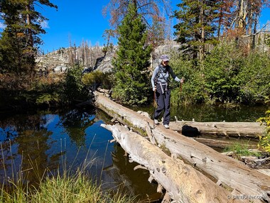 Lori makes one of our three log crossings