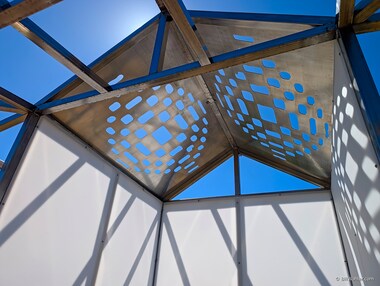 Lighthouse, 2025. Mark Baugh-Sasaki. Stainless steel, CNC-cut aluminum panels, acrylic sheet, Sonoma fieldstones.