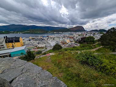 Our walking tour started with a climb to Storhaugen for the view of &Aring;lesund and Sukkertoppen, which we would climb in a couple of days.